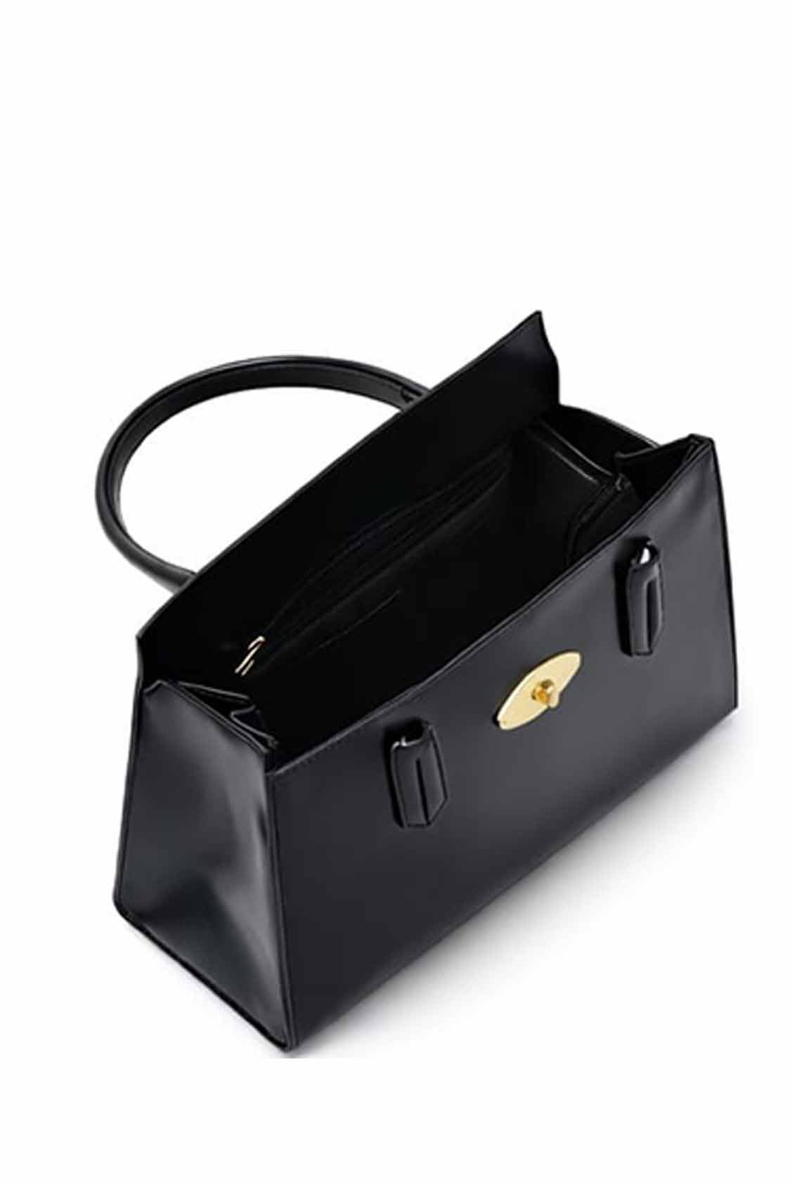Rocker shoulder bag with flaps